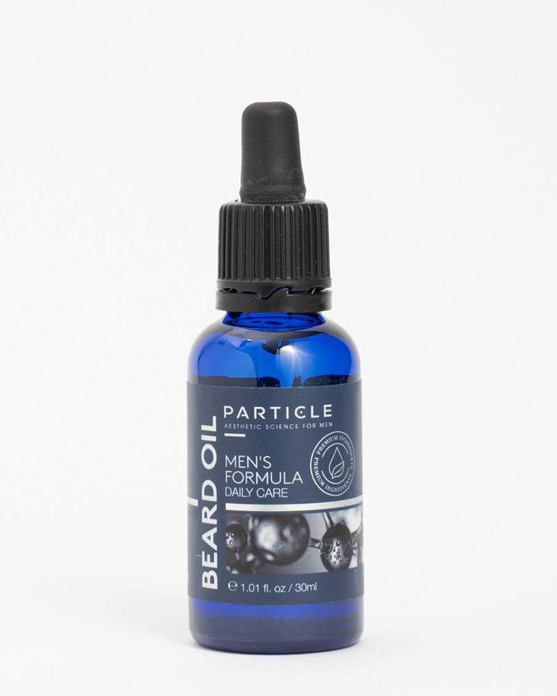 Particle Beard Oil Men's Formula Daily Care in blue bottle