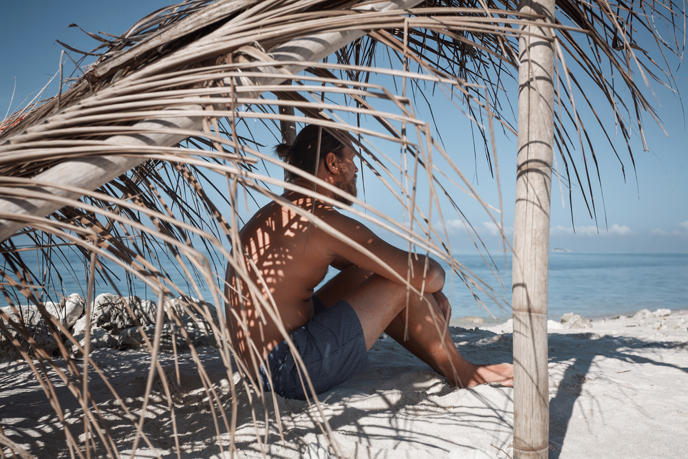 In the shade on the beach