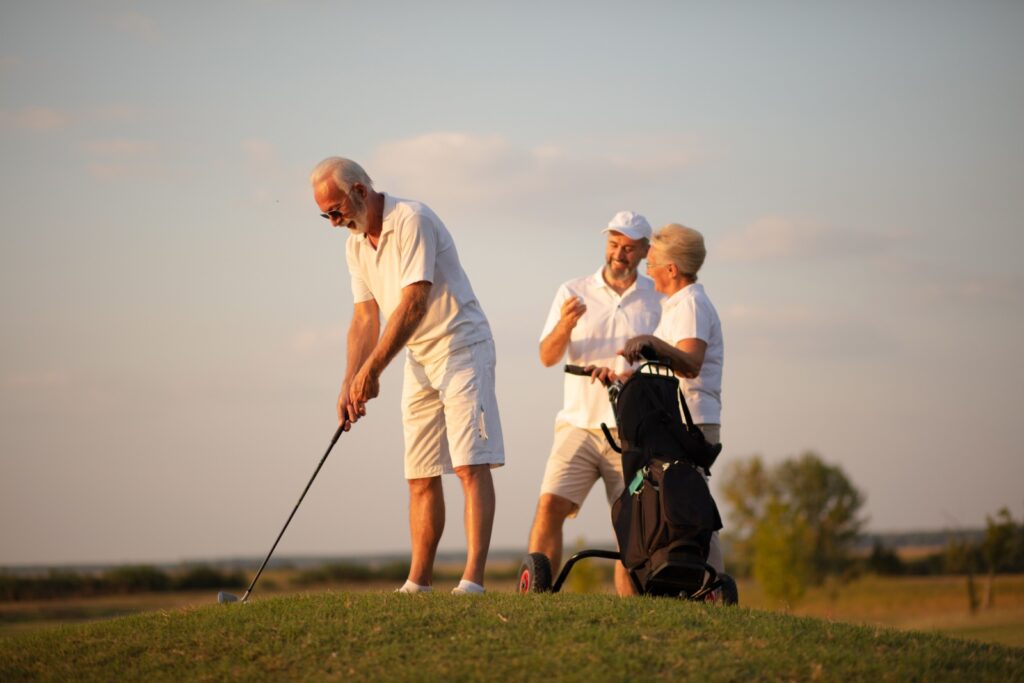 Men playing golf